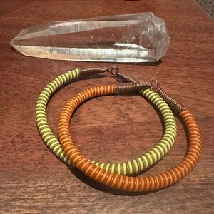 Two included handmade African Bracelets